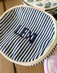navy pinstripe round travel case with embroidered name