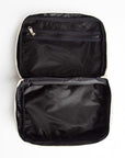 Inside of cosmetic bag with Black satin lining with open compartments on a white background