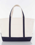 White tote bag with navy blue trim accents on a white background