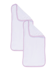 white burp cloth with pink trim on a white background