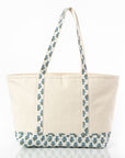 large canvas tote bag with blue floral pattern on a white background