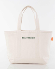 Flower Market embroidered canvas tote with green embroidery, ideal for farmers markets, flower shopping, and everyday errands.