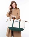 Personalized green weekender bag with embroidered name