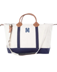 Navy canvas weekender bag wiht personalized monogram in navy embroidery