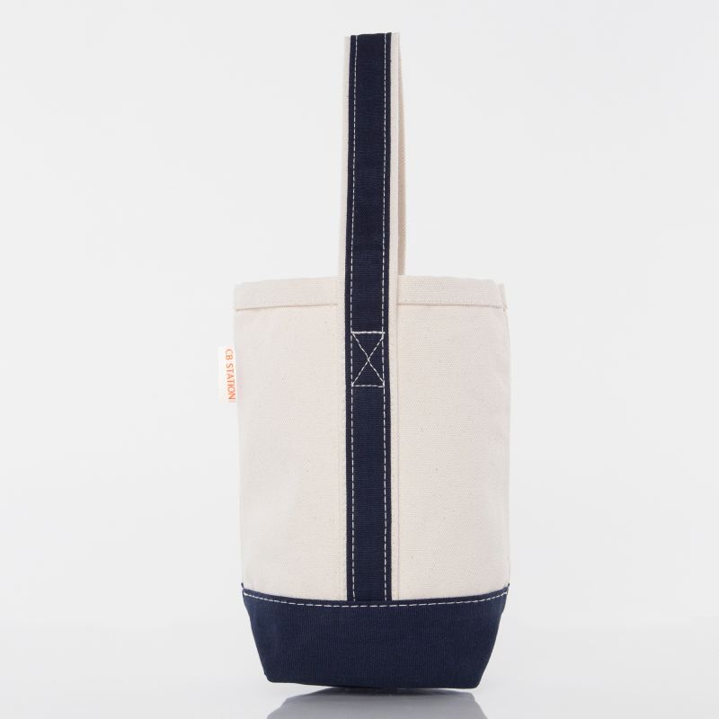 Canvas wine tote bag with navy accents on a white background