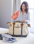 Gray monogrammed weekender duffle bag