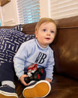 Monogrammed light blue cotton rollneck sweater on toddler boy