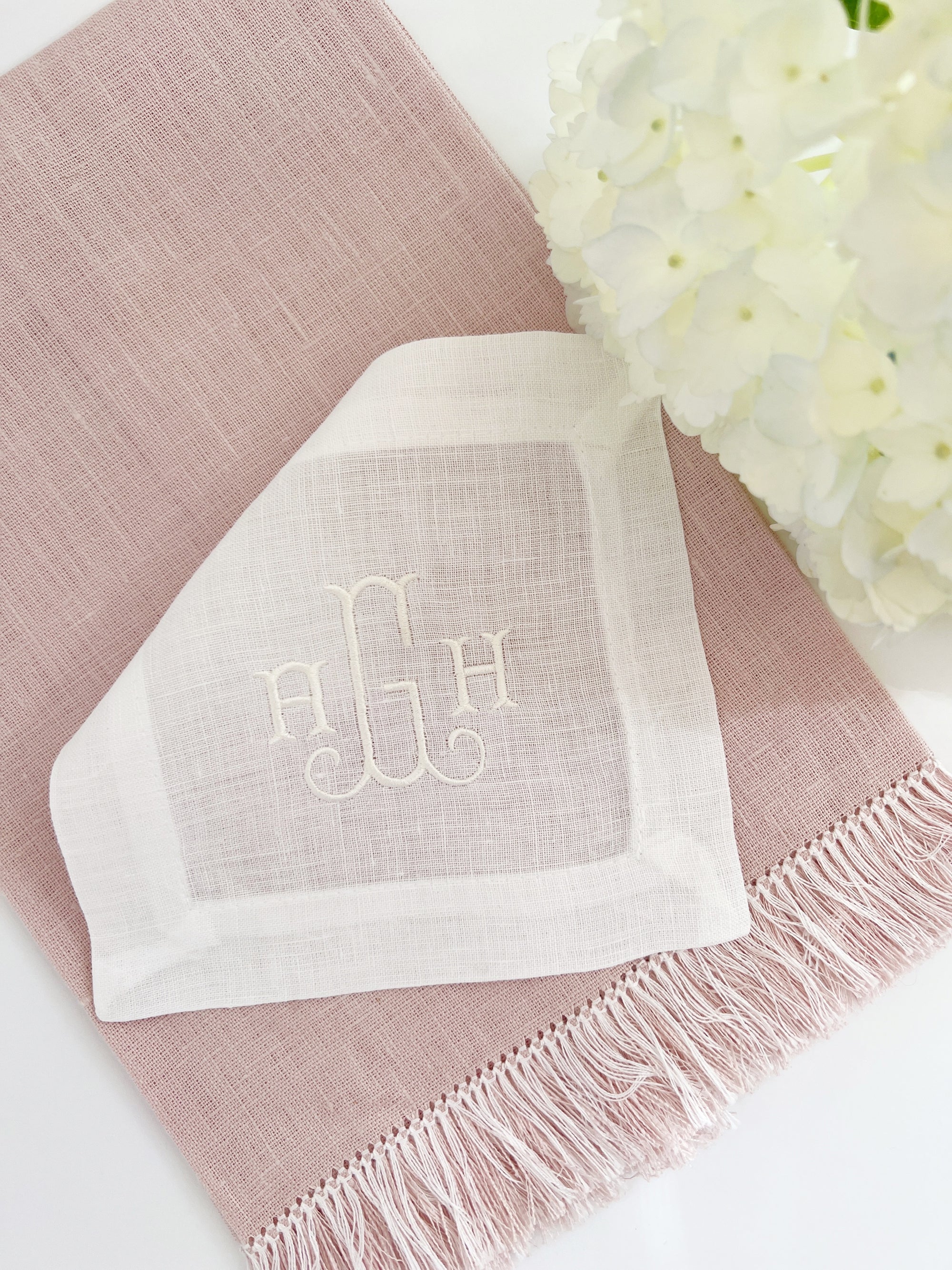 Monogrammed Fringe Guest Towels in pink, blue, and green