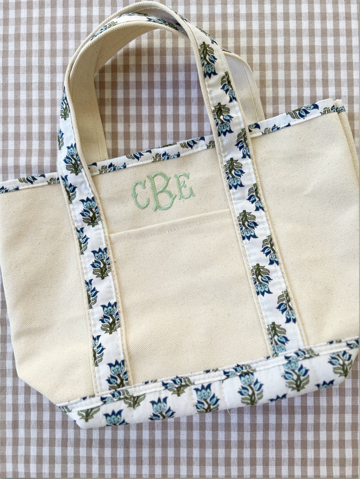 Custom embroidered canvas tote bag with block print trim