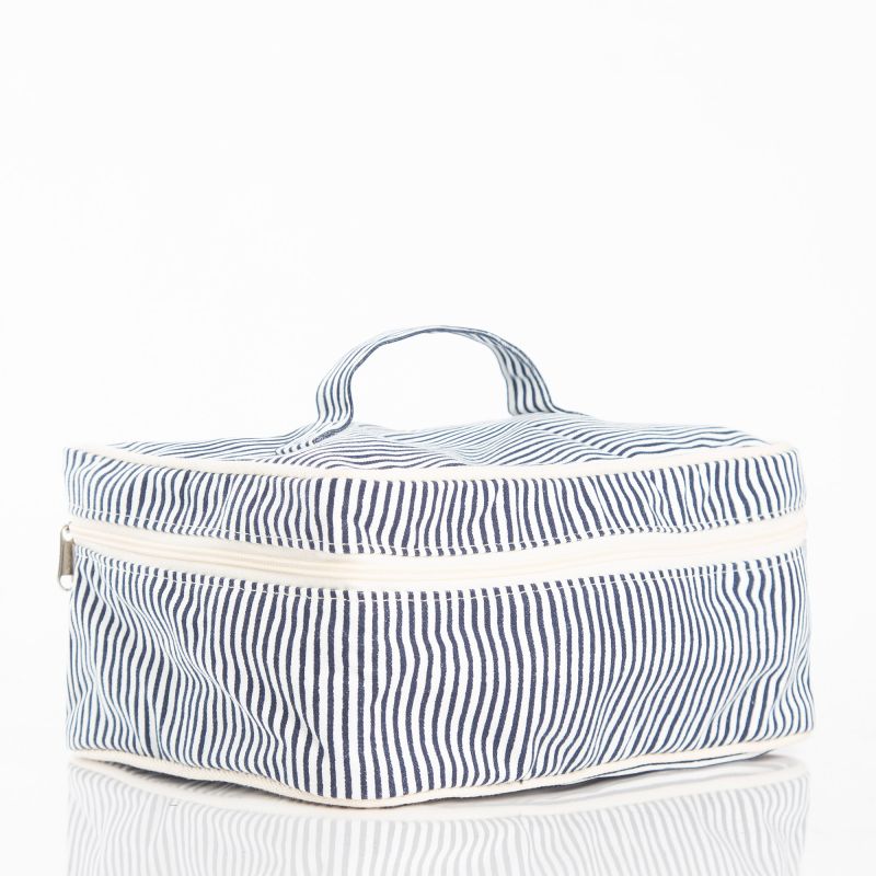 Blue and white striped canvas cosmetic bag on a white background