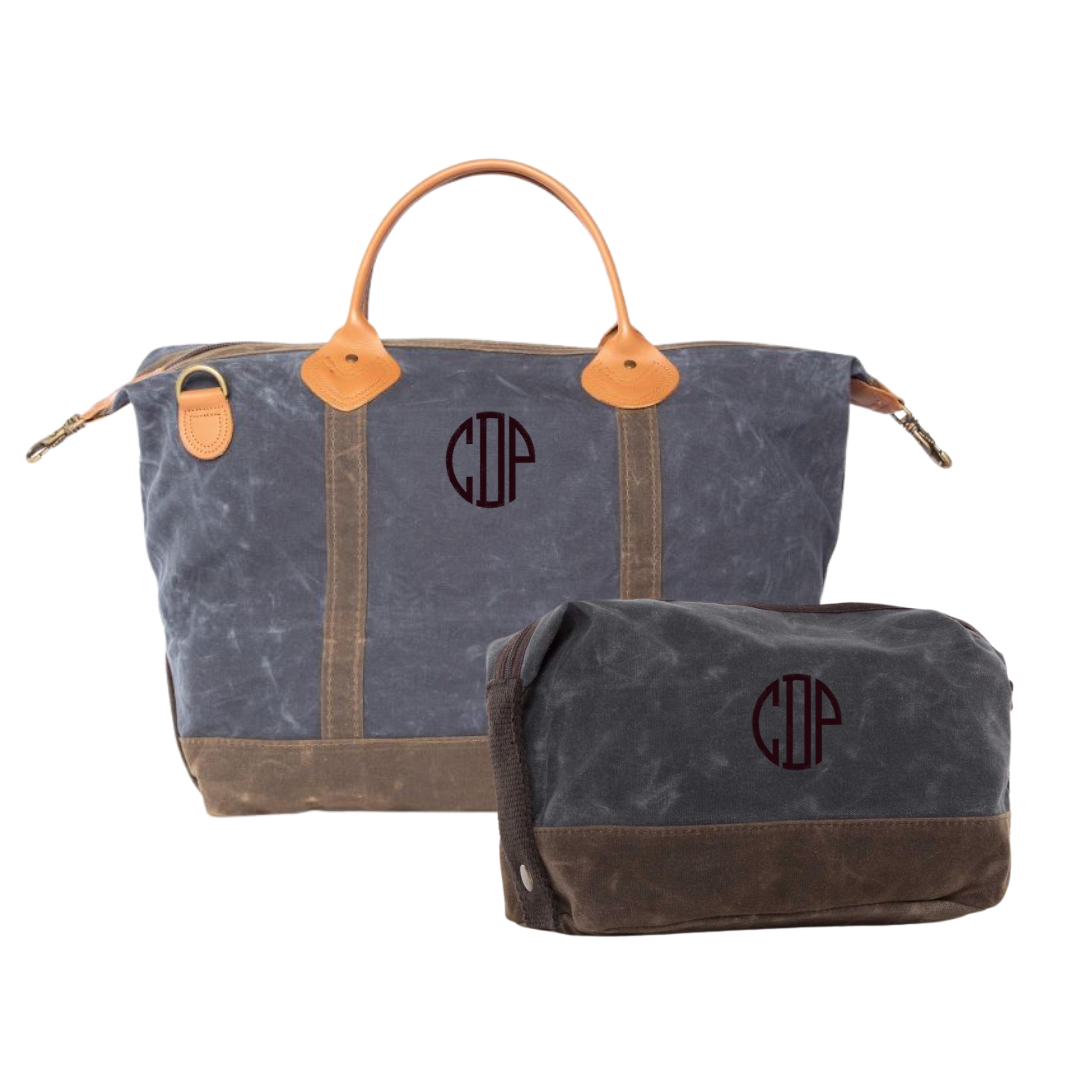 Waxed canvas duffel bag and toiletry bag with monogram on a white background