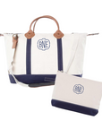 navy and white canvas weekender travel bag with matching zip pouch with embroidered monogram