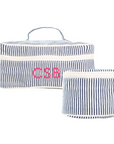 Two navy and white striped travel bags with custom embroidered initials on a white background