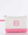Personalized natural canvas zip pouch with flat bottom and embroidered monogram.