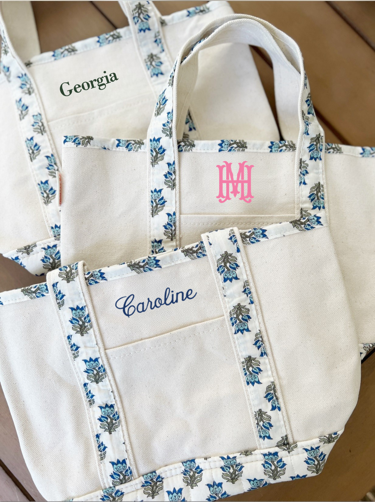 block print canvas tote bags with embroidered monogram and name on brown background