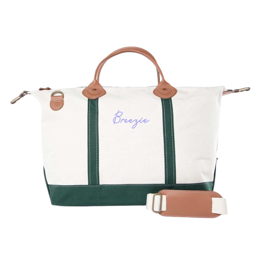 Classic canvas travel bag with green trim and custom name embroidery