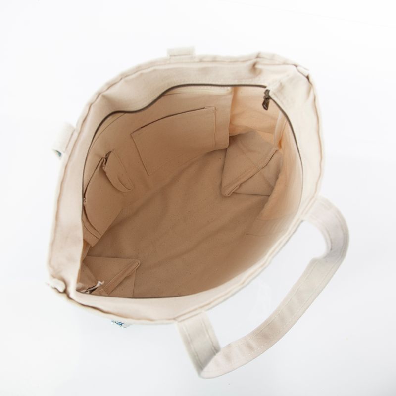 inside of canvas tote bag on white background
