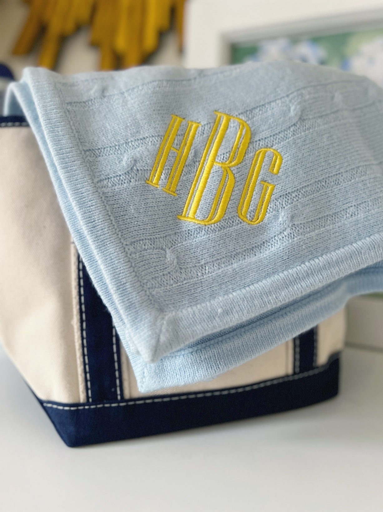 monogrammed baby blue cashmere like cable knit blanket