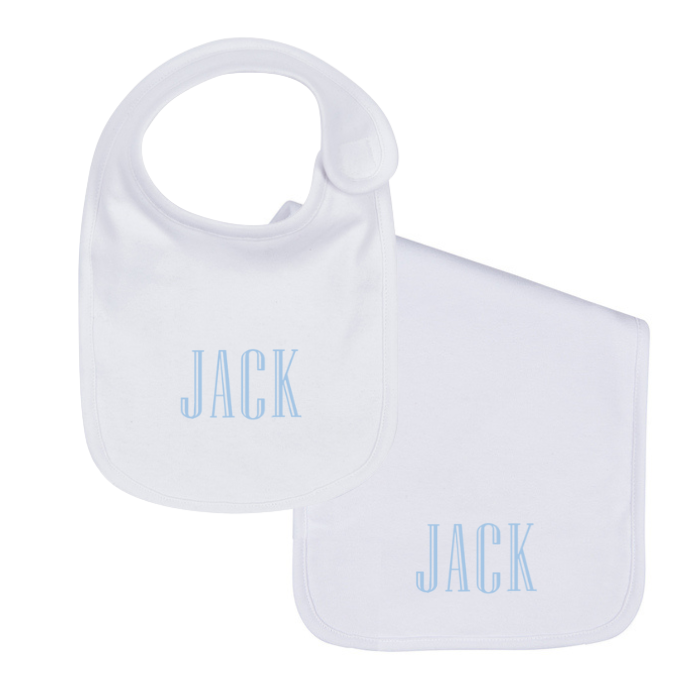 white plain edge bib and burp cloth set with embroidered name on white background